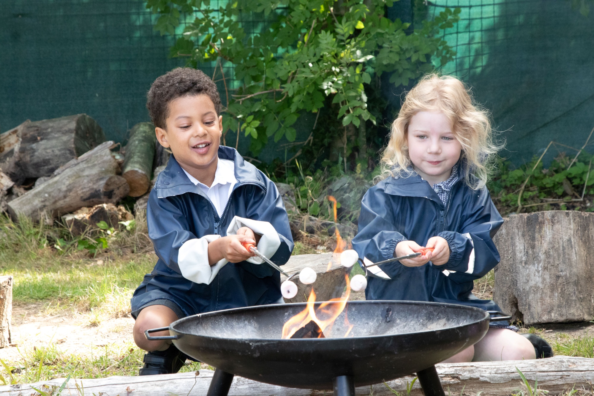 Pupils outside Manorfield Primary and Nursery School